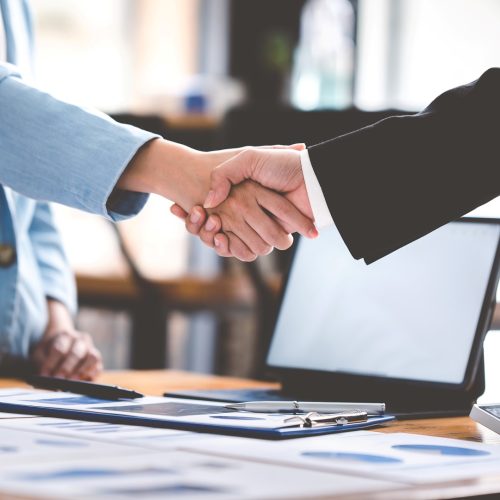 business people shaking hands at work teamwork